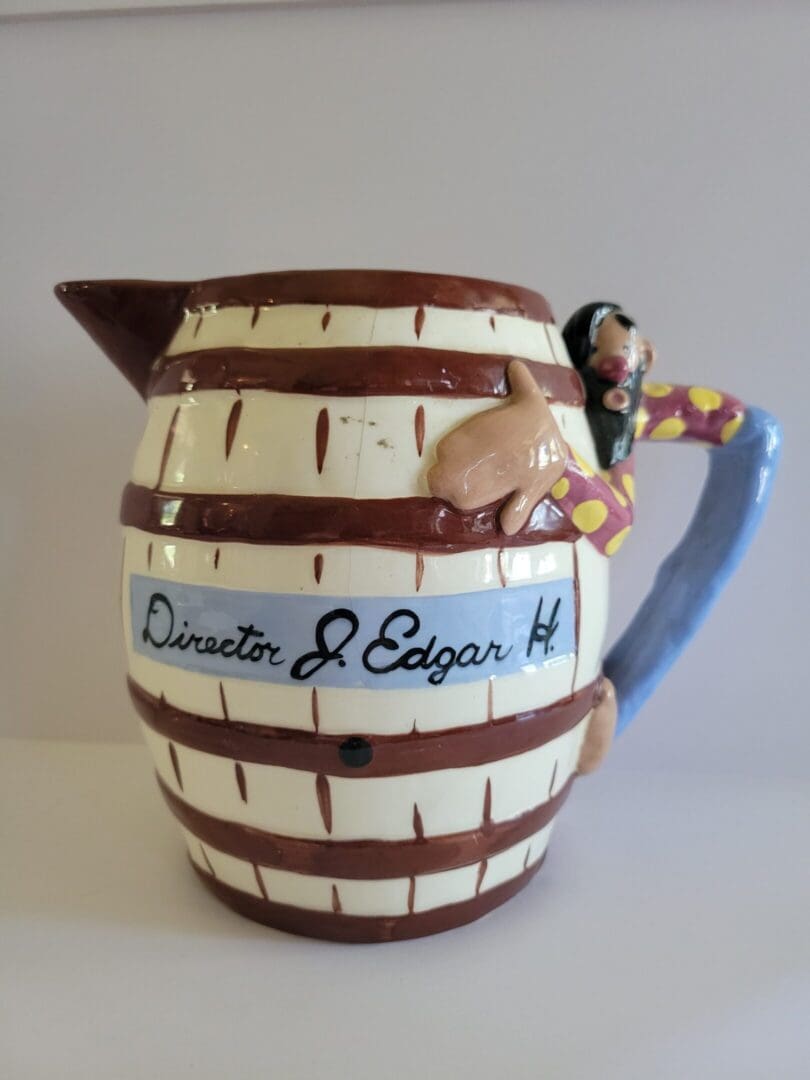 Ceramic barrel pitcher with J. Edgar H.