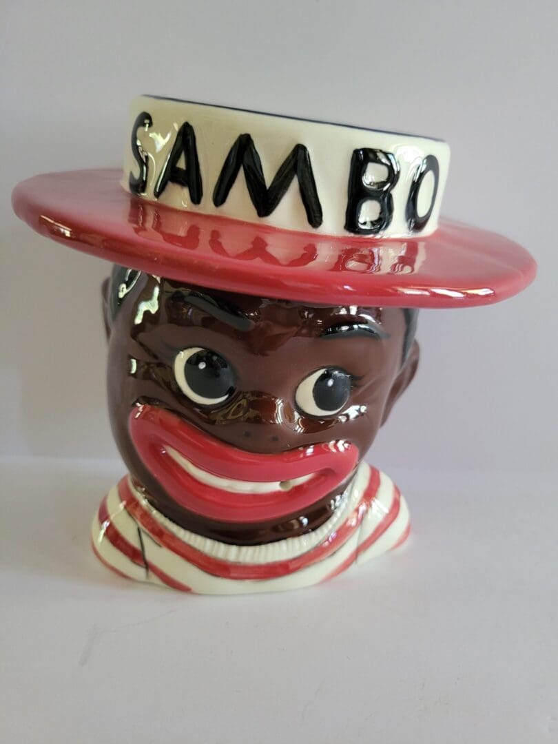 Ceramic figurine of a black boy.