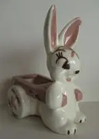 White bunny planter with pink accents.