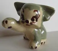 Ceramic figurine of a gray kitten.