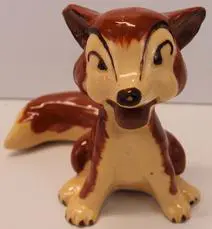 Ceramic figurine of a smiling fox.