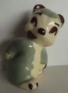 Ceramic figurine of a sitting bear.