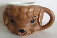 Brown poodle ceramic coffee mug.