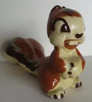 Ceramic figurine of a brown squirrel.