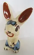 Ceramic figurine of a white rabbit.