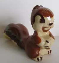 Ceramic figurine of a brown squirrel.