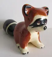 Ceramic figurine of a raccoon.