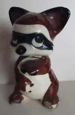 Ceramic figurine of a raccoon.