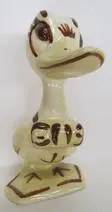 Ceramic duck figurine with brown markings.