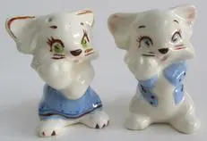 Two ceramic cat salt and pepper shakers.