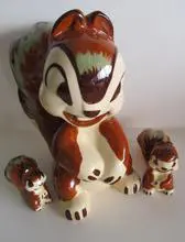 Ceramic squirrel family figurine set.