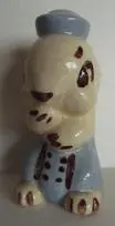 Ceramic figurine of a sailor dog.