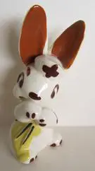 White ceramic bunny figurine with brown ears.