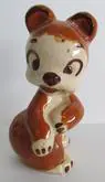 Ceramic figurine of a brown bear cub.