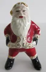 Small porcelain figurine of Santa Claus.