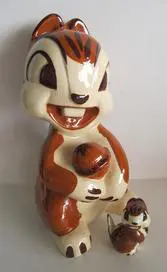 Ceramic figurine of a cartoon squirrel.