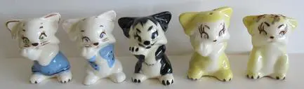 Set of five ceramic cat figurines.