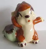 Ceramic figurine of a brown squirrel.