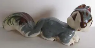 Ceramic figurine of a gray squirrel.