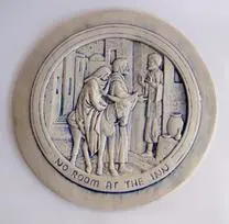 Ceramic plaque depicting the parable of no room.