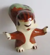 Ceramic figurine of a brown squirrel.