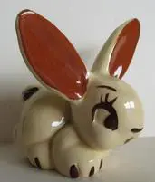 Ceramic figurine of a white rabbit.