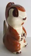 Ceramic figurine of a brown squirrel.