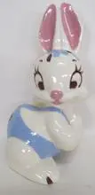 Ceramic bunny figurine with blue and pink accents.