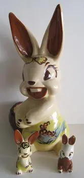 Ceramic bunny family with painted details.