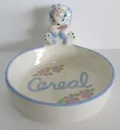 Ceramic cereal bowl with bunny handle.