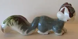 Hand-painted ceramic squirrel figurine.