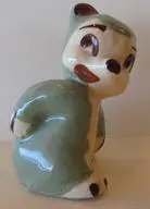 Ceramic figurine of a cartoon bear.