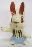 Ceramic figurine of a white rabbit.