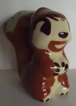 Ceramic figurine of a brown squirrel.