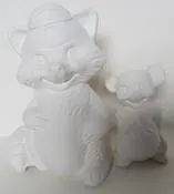 White ceramic cat and mouse figurines.