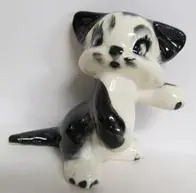 Black and white ceramic kitten figurine.