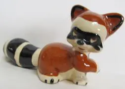 Ceramic figurine of a raccoon.