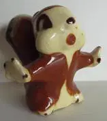 Ceramic figurine of a brown squirrel.