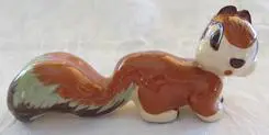 Ceramic figurine of a brown squirrel.