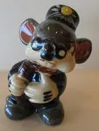 Ceramic figurine of a mouse in a hat.