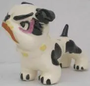 A black and white ceramic bulldog figurine.