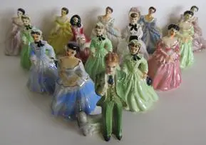 Collection of vintage porcelain figurines of couples.