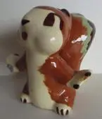 Ceramic figurine of a brown squirrel.