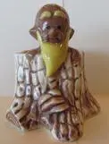 Ceramic figurine of a man with a beard.