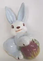 A blue and white ceramic Easter bunny.