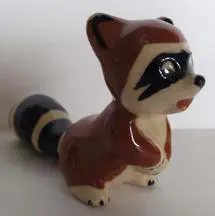 Ceramic figurine of a raccoon.