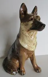 Ceramic figurine of a German Shepherd.