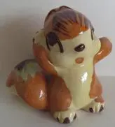 Ceramic figurine of a brown squirrel.