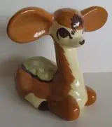 Ceramic figurine of a brown deer.